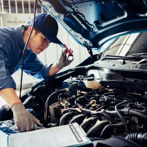 How do I find a reputable mechanic or service center for my car
