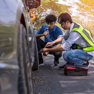 How does a roadside assistance or car breakdown service help you in an emergency situation?