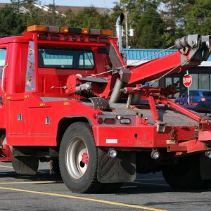 What is the formula for a tow truck's towing capacity?