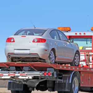 What should I do if I need to call a tow truck