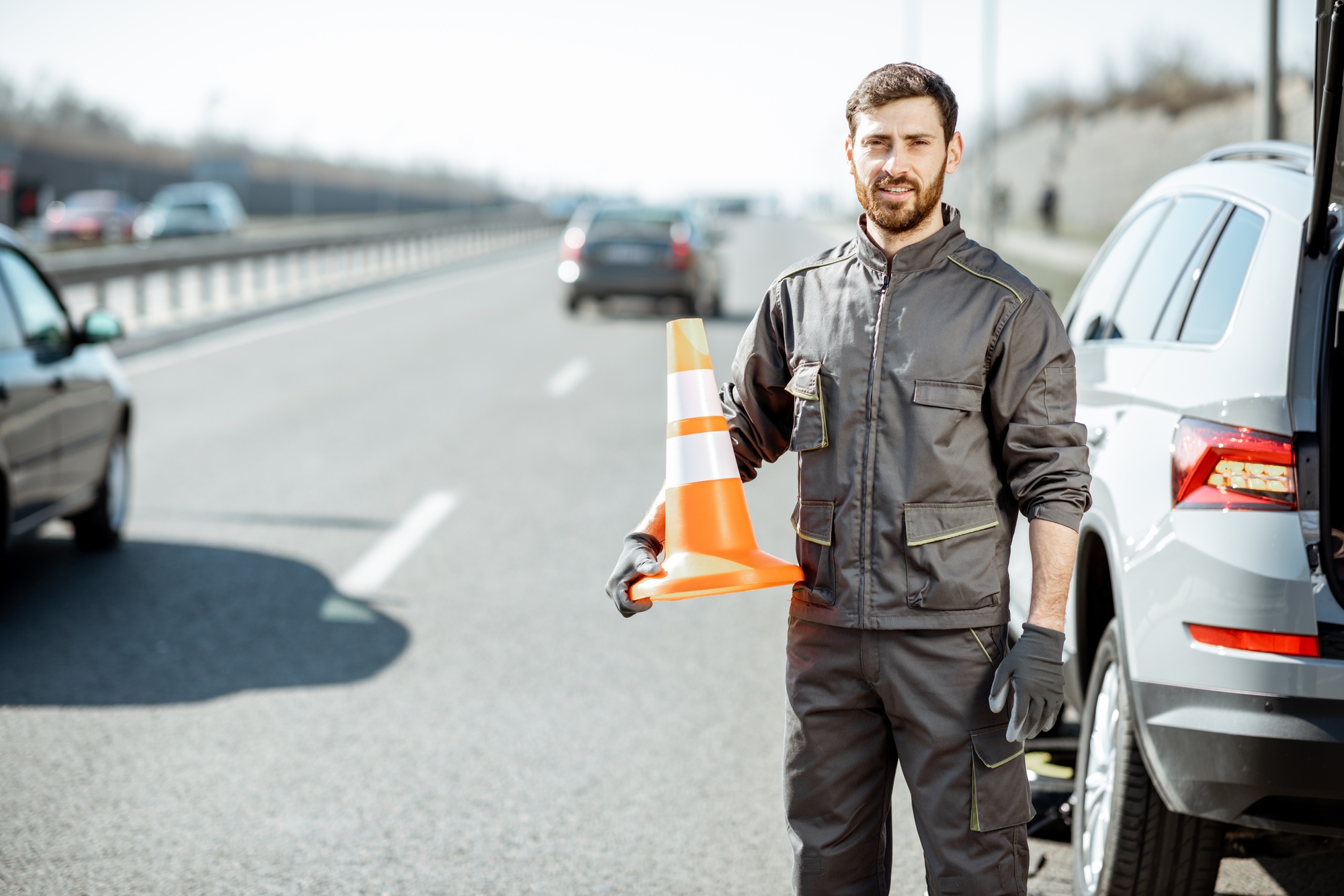 Road assistance worker on the roadside